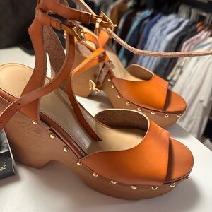 Stylish Orange Leather Mules with Gold Accents